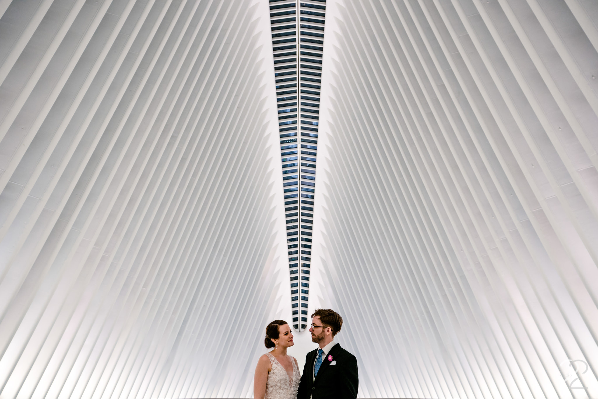  New York City is full of endless opportunities for outstanding wedding photos, so choosing a spot for unique bride and groom portraits was a tough decision. Megan ended up taking Kenton and Sarah to Oculus for a modern, clean, urban look. 